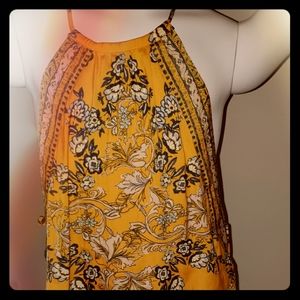 Orange halter top with flower pattern